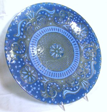 Blue fused art glass plate by Higgins with bubbles as part of the decoration.